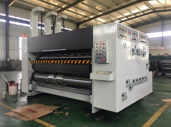 Low cost automatic printing slotting die cutting machine